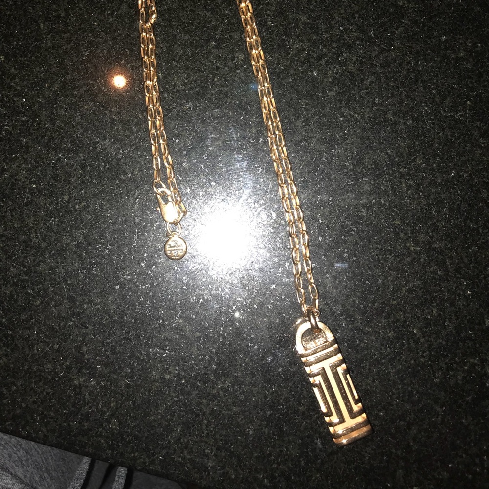 Tory Burch fit bit pendant